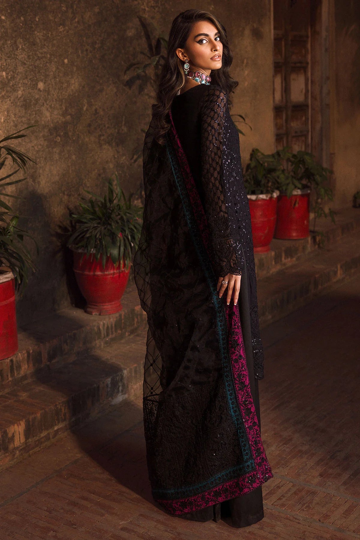 Graceful Silk Net Outfit with Elegant Stitching